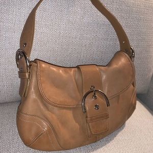 Tan coach purse gently used great condition!
